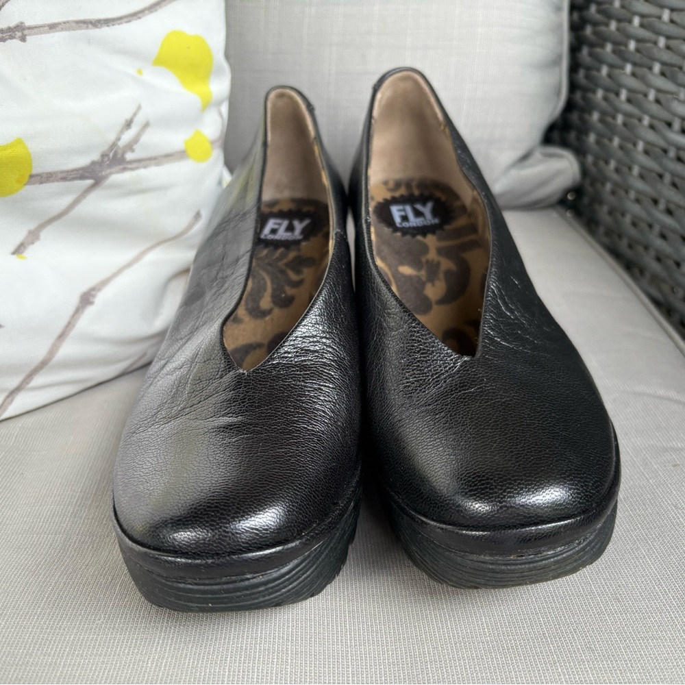 Fly London Black Leather Flats with Durable Sole